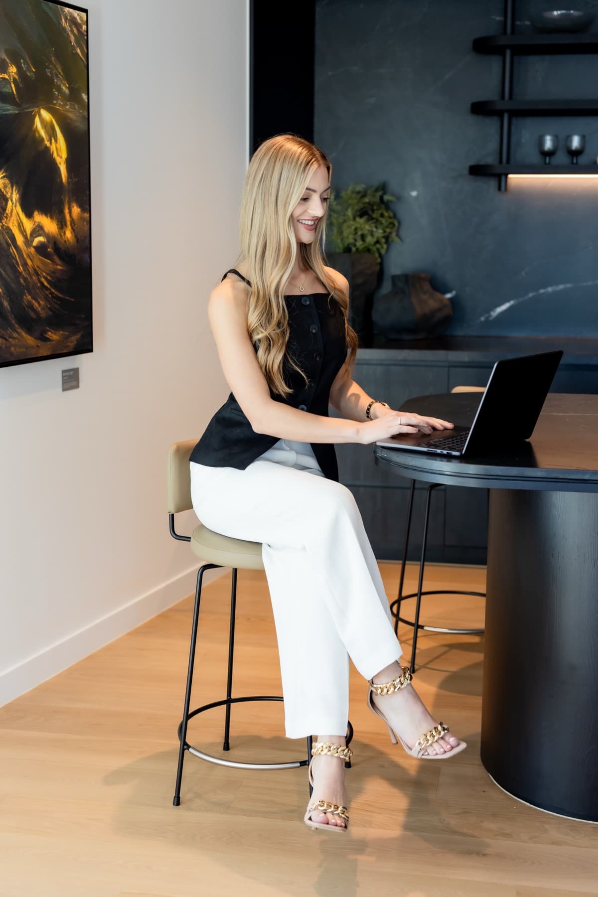 Rebecca Tickner reviewing an investment loan portfolio